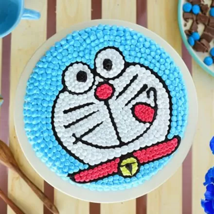 Doraemon Cake - Decorated Cake by Slice of Heaven By - CakesDecor